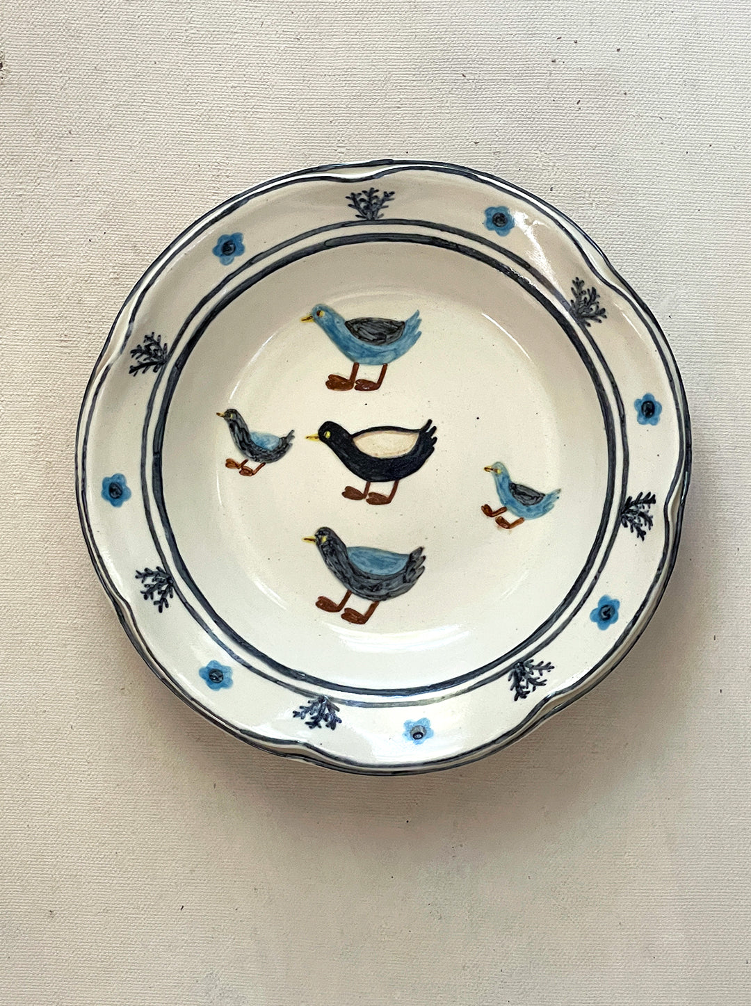 SMALL LOW BOWL WITH DUCKS