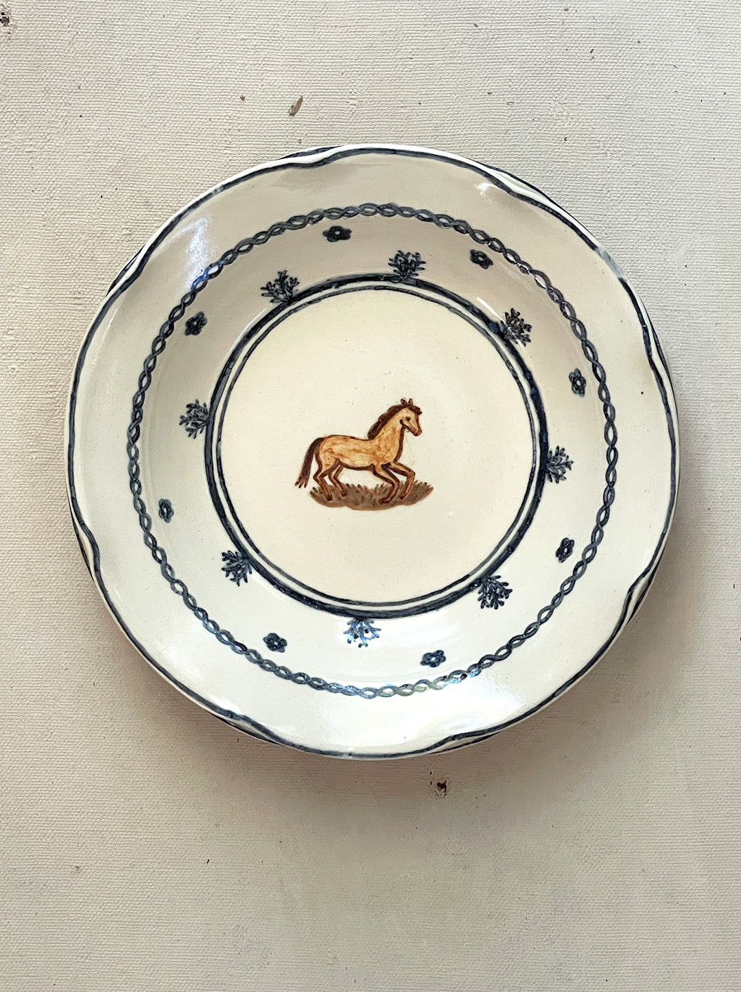 SMALL LOW BOWL WITH TINY HORSE